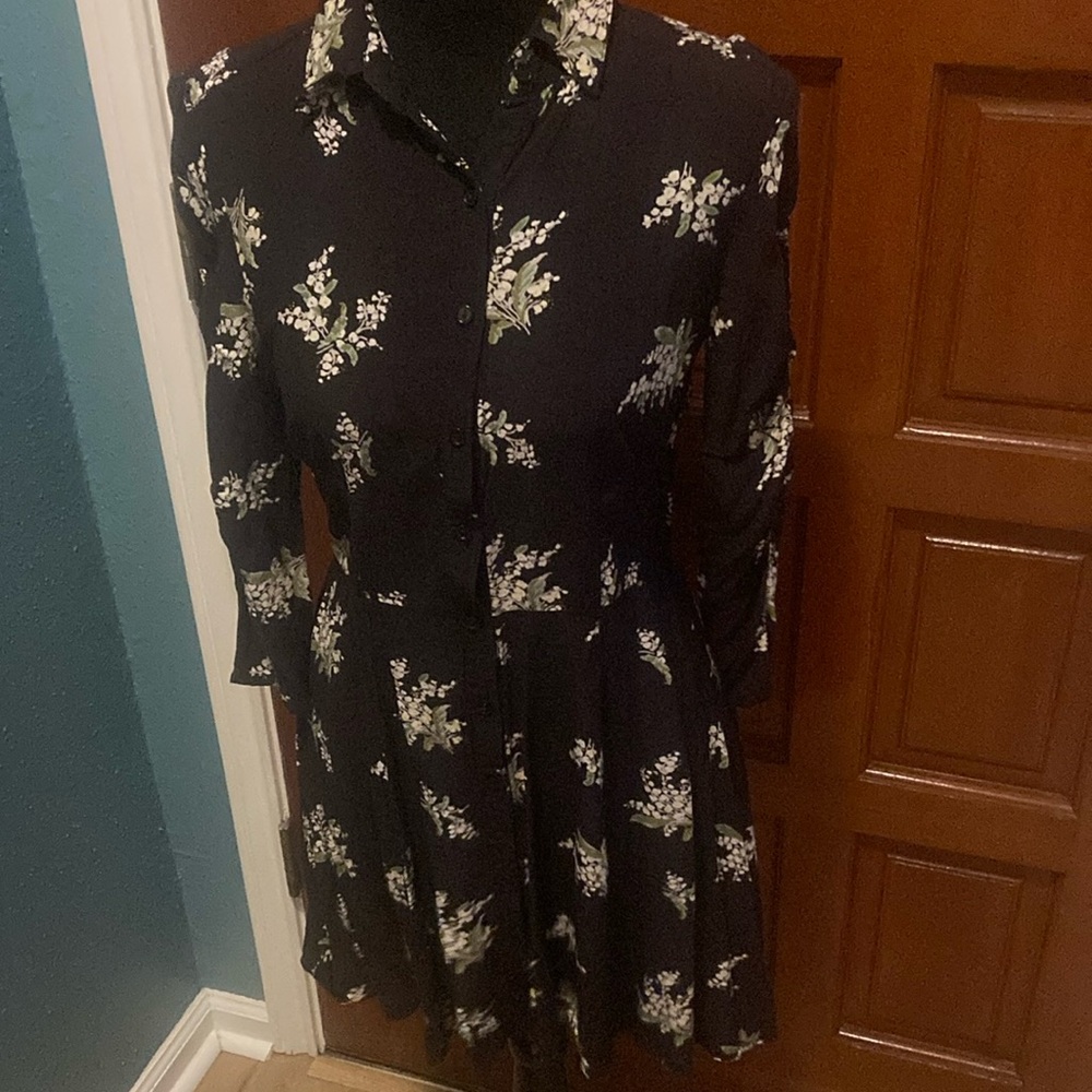 Free people dress. Size xs. Black with flowers